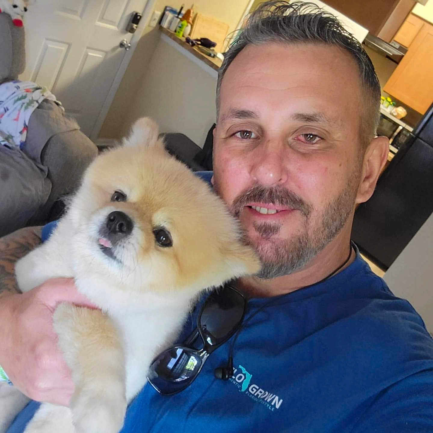 Mr.puff is registered to the contest to win money with this photo: accessories, adult, animal, canine, clothing, coat, doctor, dog, face, glasses, head, male, man, person, pet, photography, portrait, puppy, sunglasses, t_shirt