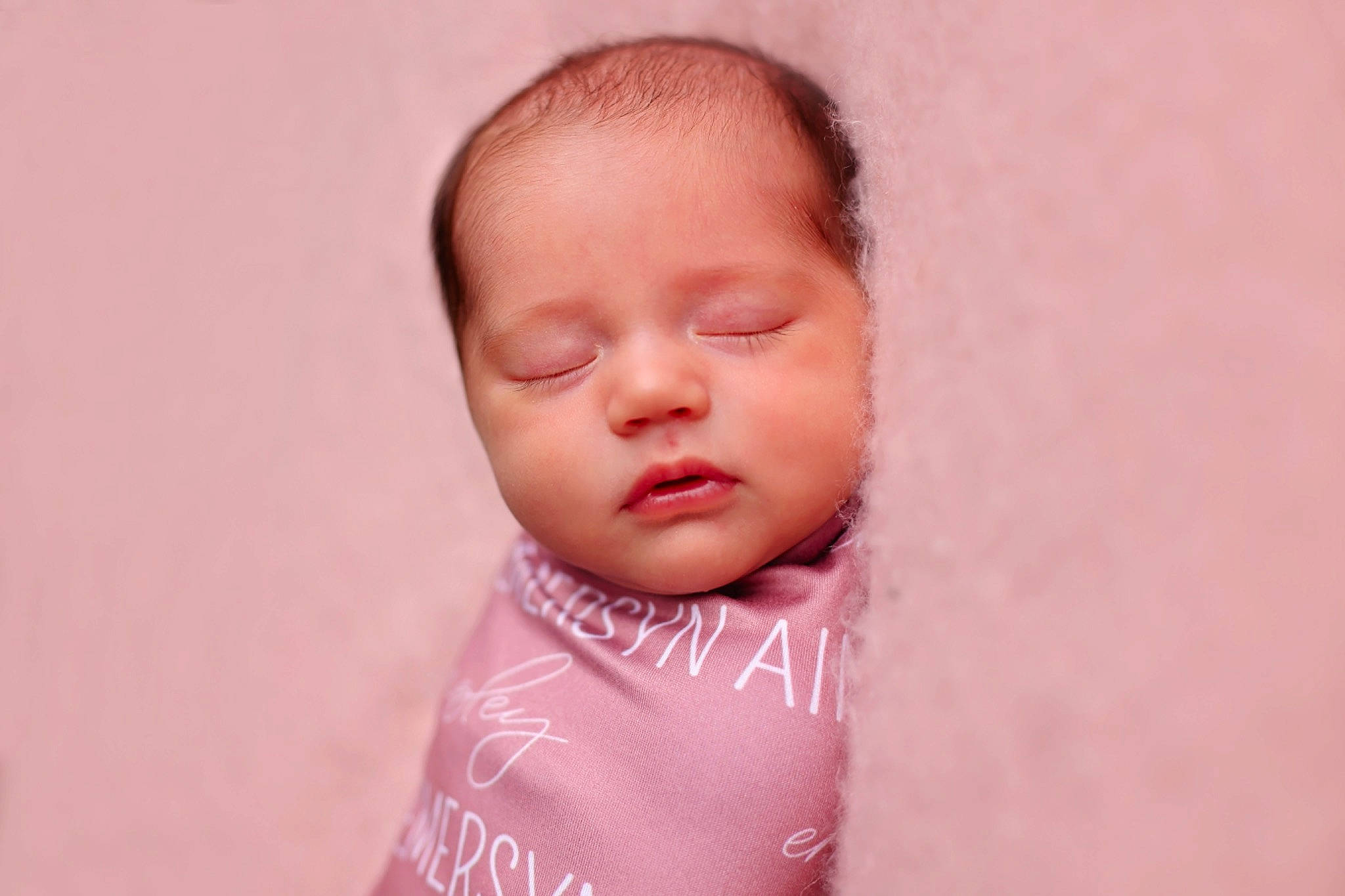 Emersyn is registered to the contest to win money with this photo: baby, baby_toddler_clothing, cheek, child, chin, comfort, ear, eyebrow, eyelash, face, gesture, happy, lip, mouth, neck, nose, person, pink, skin, sleeve