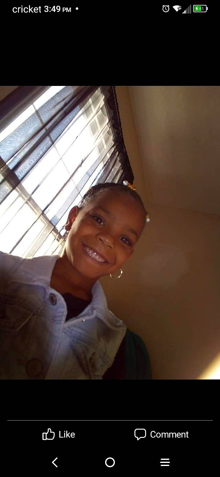 Kamiah is registered to the contest to win money with this photo: baby, child, darkness, dress, flash_photography, formal_wear, fun, gesture, happy, joy, laugh, person, portrait, portrait_photography, room, sitting, smile, suit, toddler, white_collar_worker