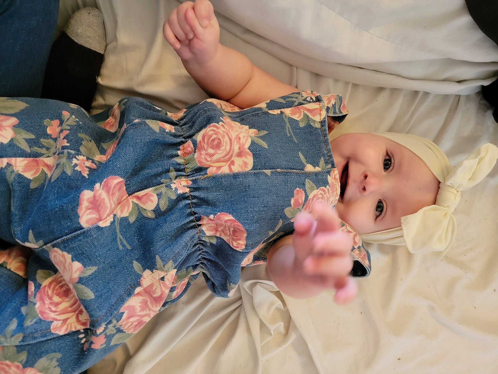 Dekklynn joined the competition — help win amazing prizes! arm, baby_toddler_clothing, comfort, dress, eyelash, finger, gesture, hand, joy, linens, nail, pattern, person, pink, plant, product, skin, sleeve, textile, thigh