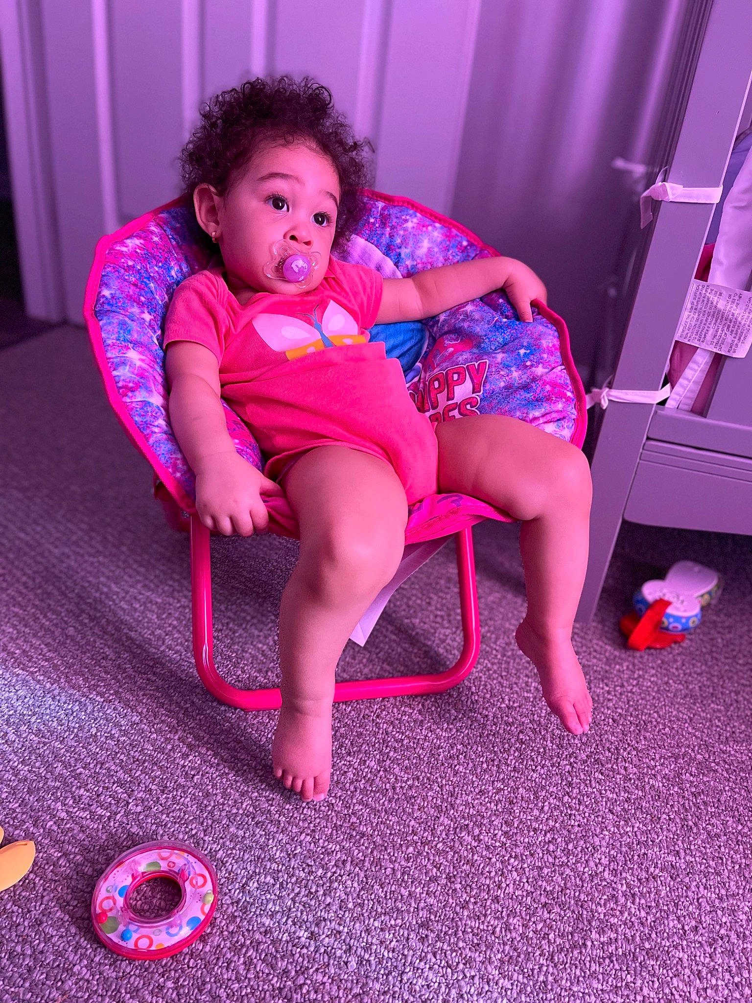 Alivia is registered to the contest to win money with this photo: chair, comfort, face, flash_photography, floor, flooring, human_leg, knee, leg, leisure, magenta, person, pink, purple, red, sandal, shoe, shorts, shoulder, sneakers
