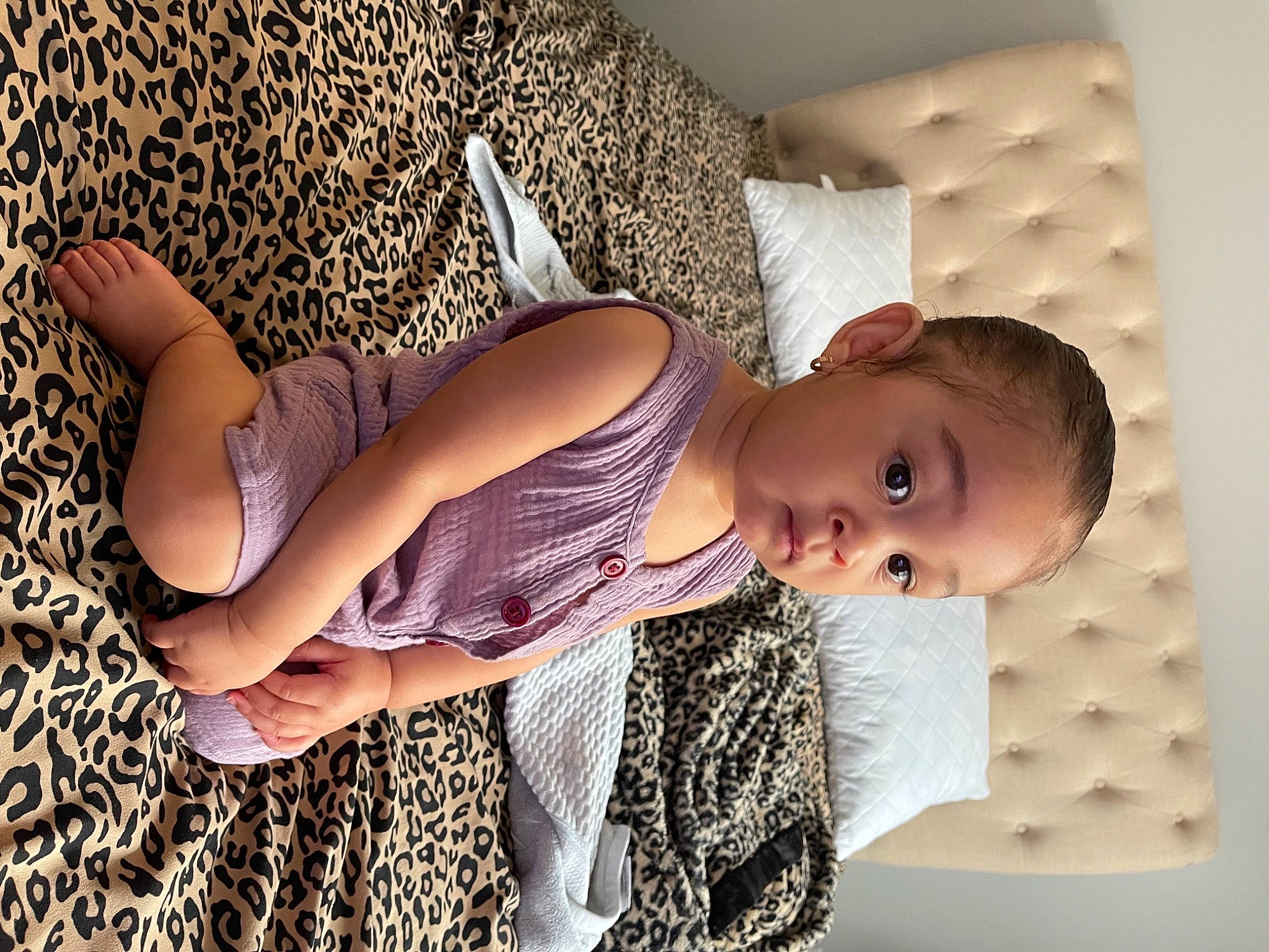 Alivia is registered to the contest to win money with this photo: arm, baby, comfort, dress, eye, facial_expression, finger, hairstyle, hand, human, human_body, joint, leg, neck, person, pink, product, shoulder, skin, sleeve