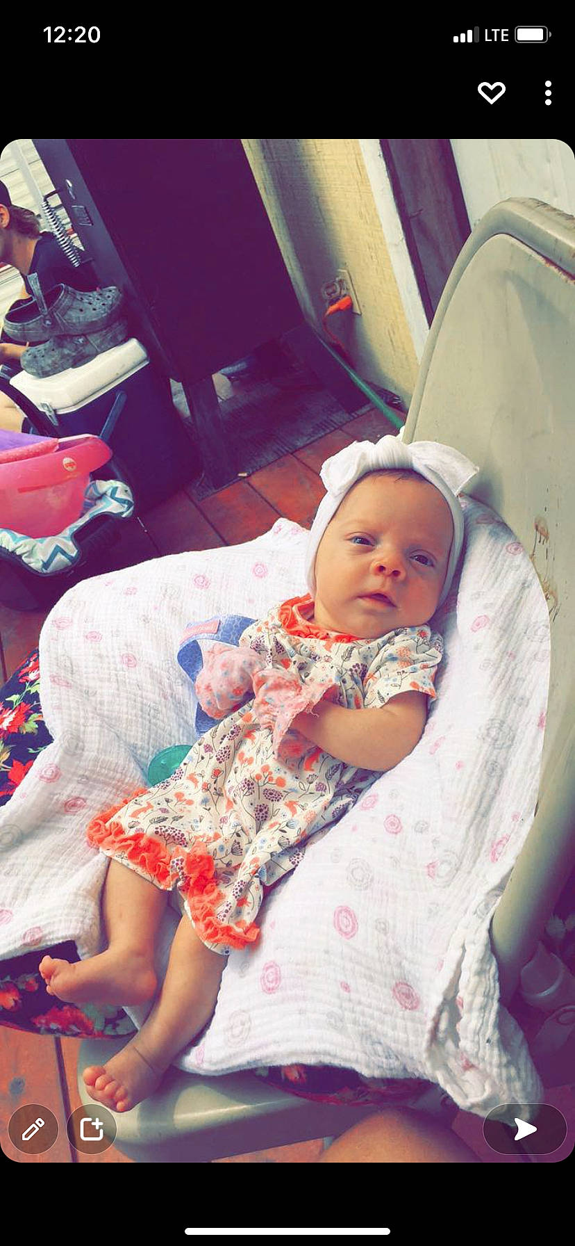 Emberlee is registered to the contest to win money with this photo: baby, baby_products, baby_toddler_clothing, chair, child, comfort, event, fun, happy, headwear, human_leg, lap, linens, magenta, person, pink, room, sitting, skin, thigh