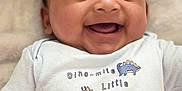 Siraj joined the competition — help win amazing prizes! animal, baby, babylaughing, clothing, dinosaur, face, happy, head, laughing, person, photography, portrait, reptile, smile, t_shirt