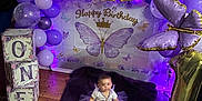 Brynleigh is registered to the contest to win money with this photo: baby, balloons, banner, birthday, blanket, blocks, butterfly, celebration, child, decorations, floor, gold, indoors, lighting, monthly_photos, party, portrait, purple, purple_tutu, smiling