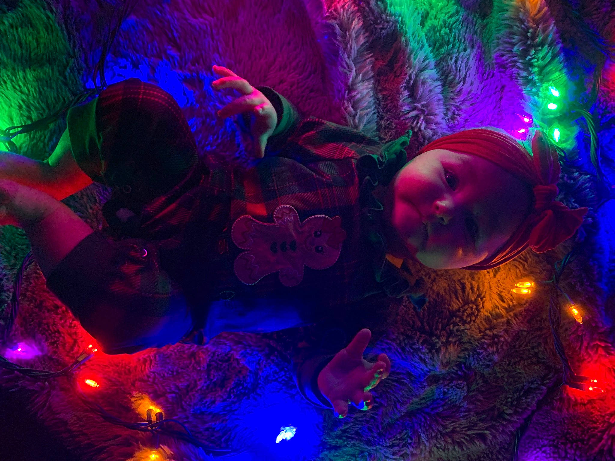 Brexleigh is registered to the contest to win money with this photo: art, christmas_decoration, christmas_ornament, circle, electric_blue, entertainment, event, holiday_ornament, light, magenta, organism, ornament, person, plant, purple, red, space, technology, tree, violet