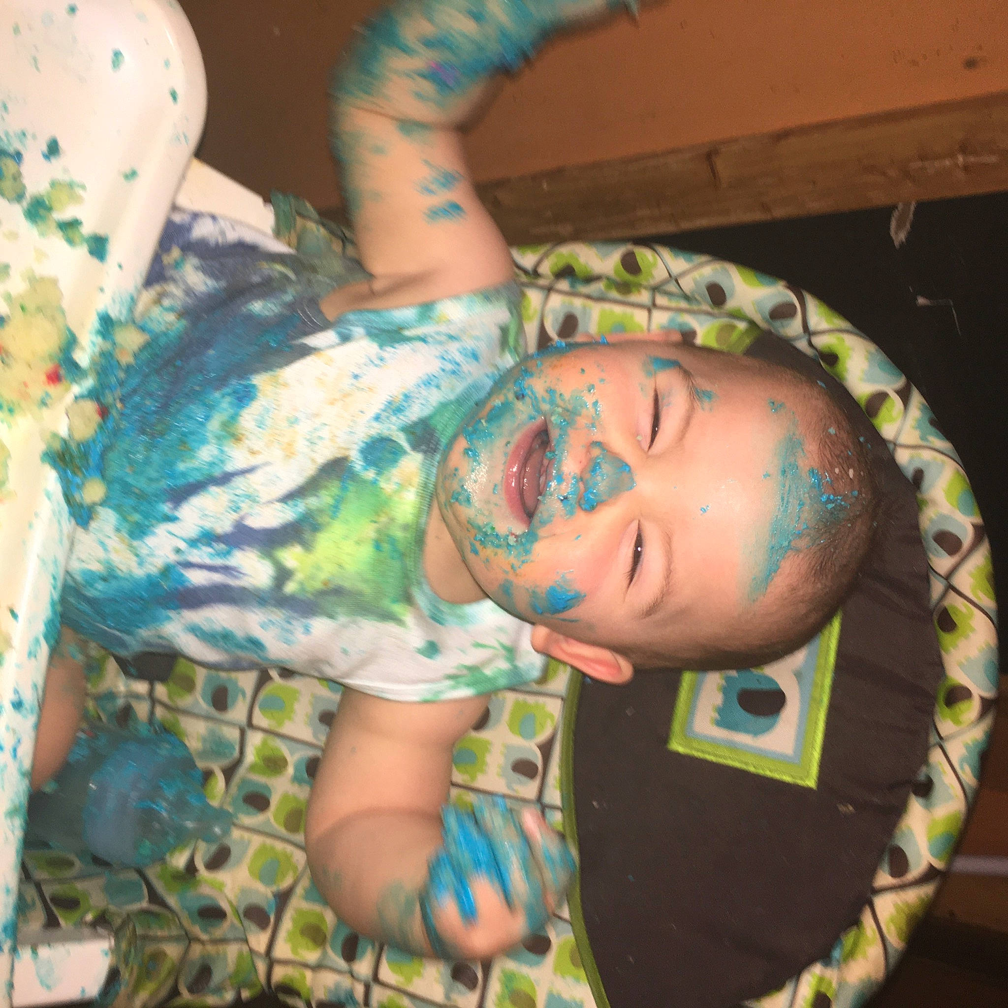 Leo is registered to the contest to win money with this photo: arm, camouflage, child, cool, ear, forehead, head, military_camouflage, person, toddler