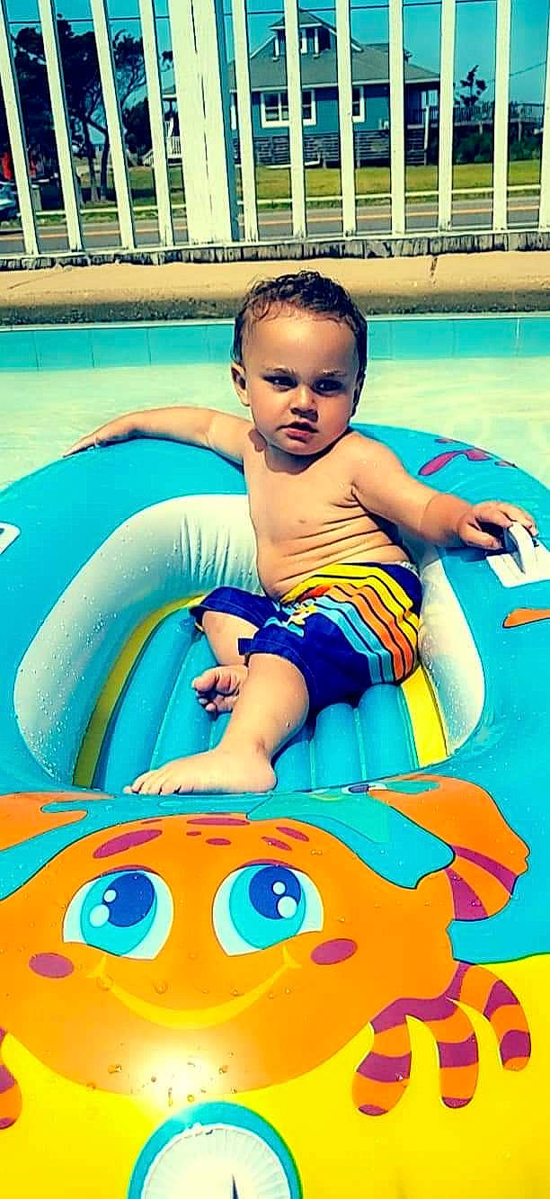 Robbie joined the competition — help win amazing prizes! aqua, arm, azure, baby, baby_toddler_clothing, beauty, blue, child, eye, facial_expression, fun, happy, head, leisure, organ, person, recreation, summer, swimming_pool, toddler