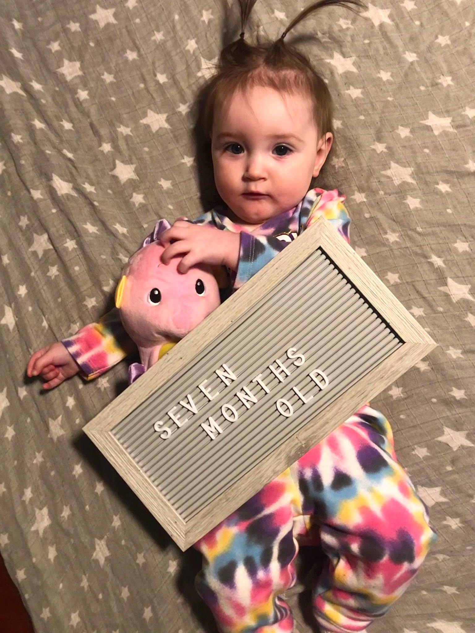 Saraya joined the competition — help win amazing prizes! baby, baby_toddler_clothing, cheek, child, doll, facial_expression, fashion_accessory, font, fun, happy, magenta, pattern, person, pink, play, sitting, sleeve, textile, toddler, toy