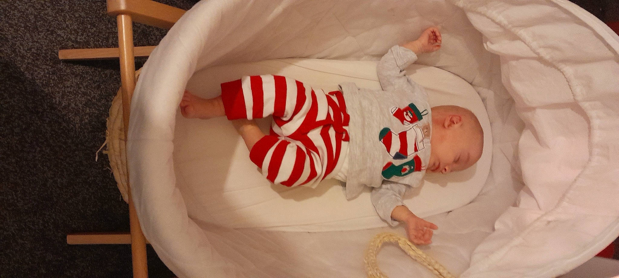 Frankie is registered to the contest to win money with this photo: baby, baby_products, baby_safety, baby_sleeping, baby_toddler_clothing, bed, bedtime, carmine, child, comfort, event, eye, hand, headgear, human_body, infant_bed, linens, person, room, skin