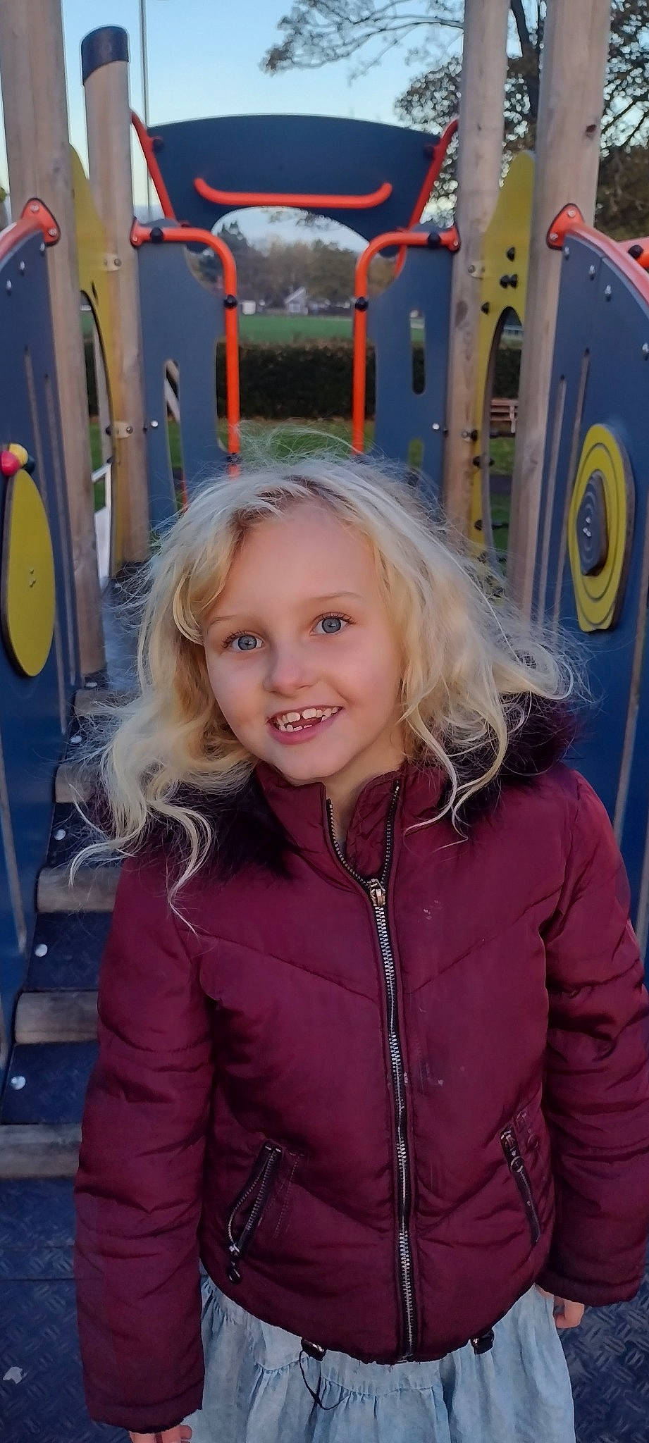 Darcie joined the competition — help win amazing prizes! blond, child, chin, city, electric_blue, facial_expression, fun, hairstyle, happy, jacket, jewellery, joy, leisure, machine, motor_vehicle, person, recreation, sleeve, smile, standing