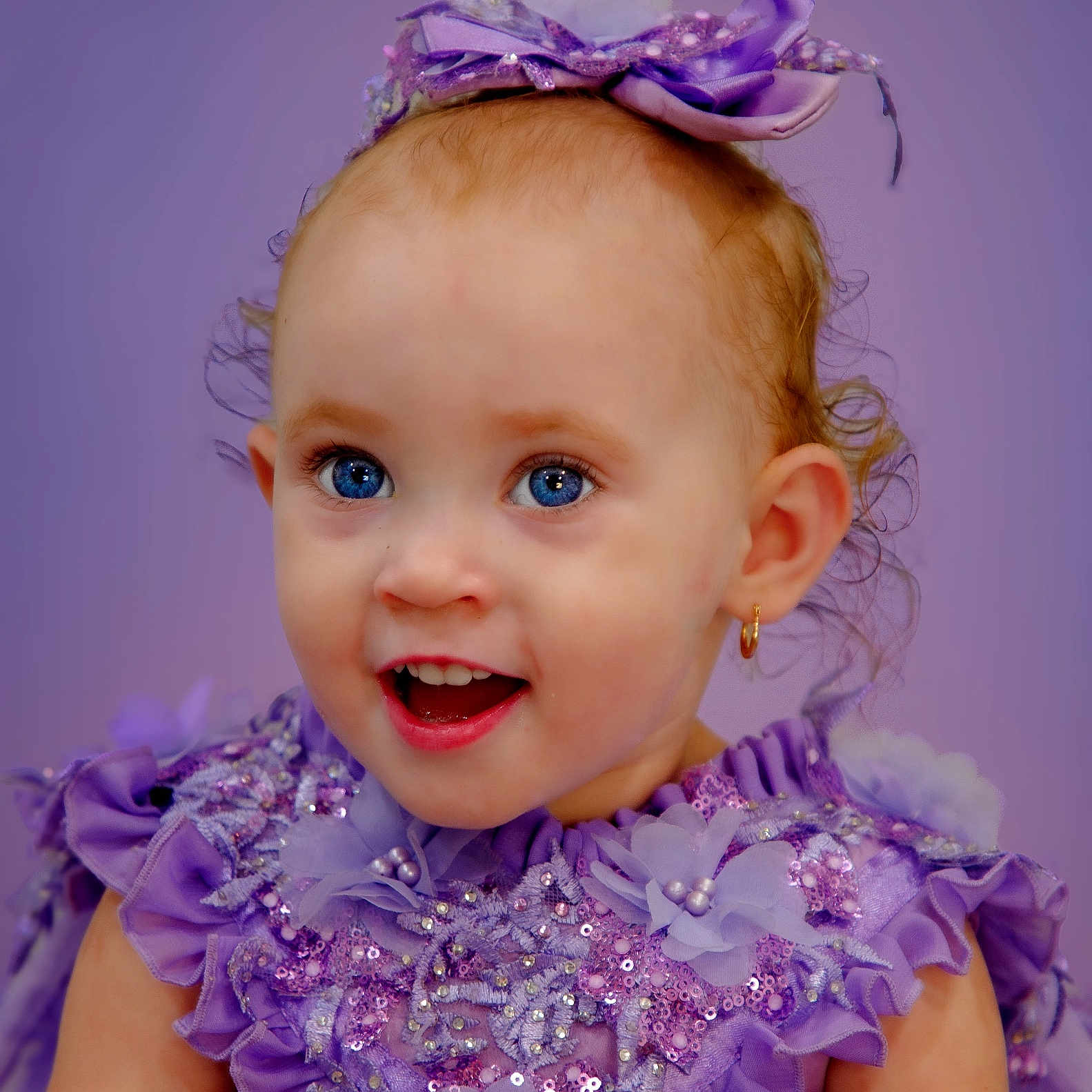 Zella is registered to the contest to win money with this photo: accessories, baby, bodypart, clothing, dress, face, finger, flower, flowerarrangement, flowerbouquet, formalwear, hand, head, headband, jewelry, person, photography, plant, portrait, purple