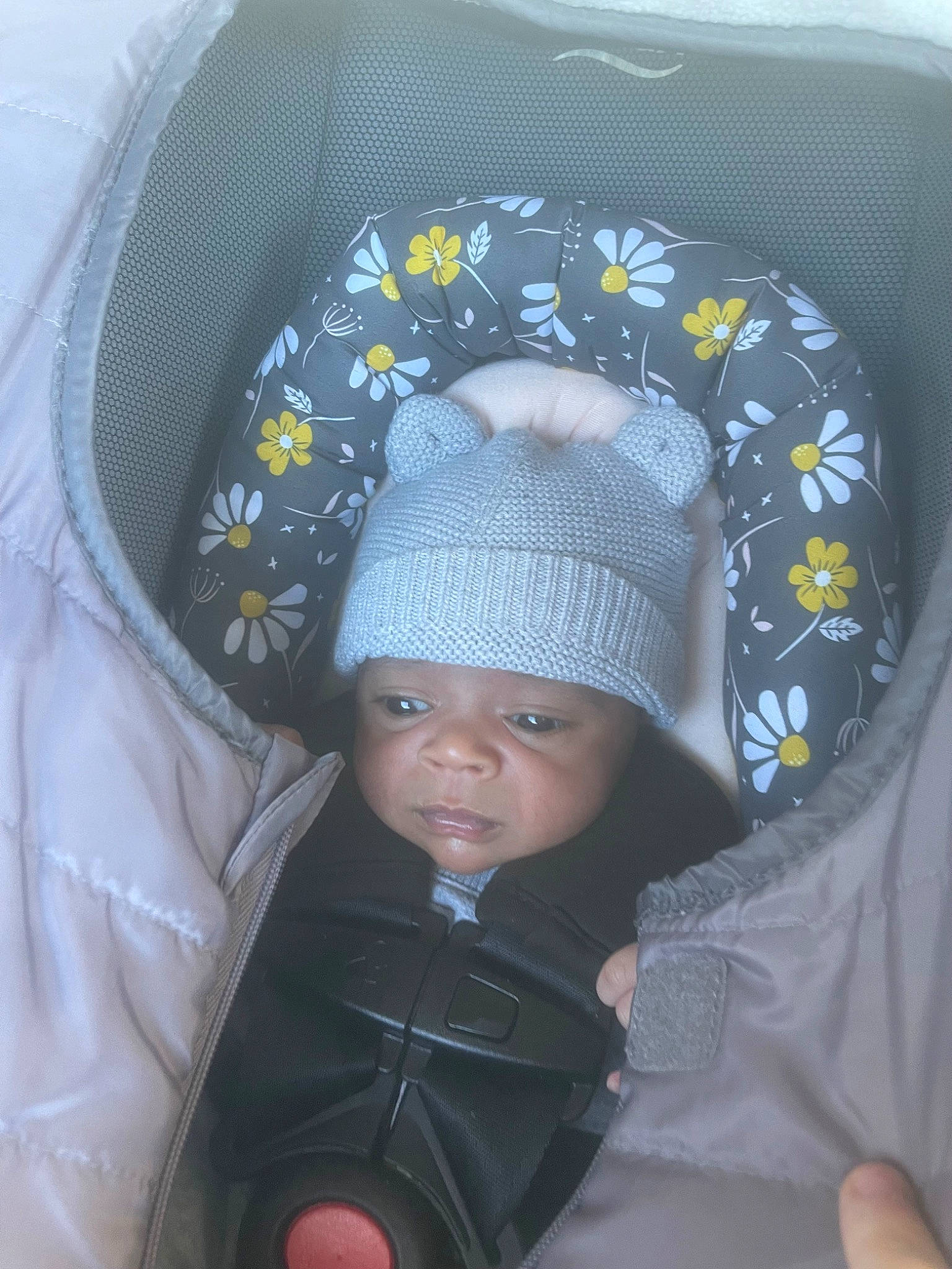 Emersyn is registered to the contest to win money with this photo: baby, baby_products, baby_toddler_clothing, beanie, bonnet, cap, car_seat, cheek, child, comfort, fashion_accessory, head, headwear, knit_cap, outerwear, pattern, person, photograph, product, sleeve