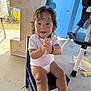 barefoot, birthday, blue_chair, celebration, chair, child, clapping, cute, daylight, decorations, happy, high_chair, indoor, number_one, person, playful, smiling, toddler, wet_hair, white_shirt