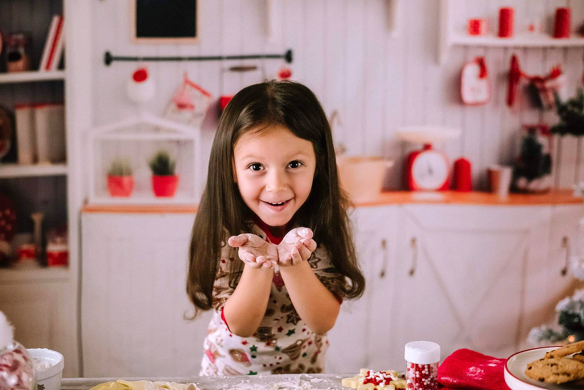 Jemma is registered to the contest to win money with this photo: baking, child, comfort_food, cooking, countertop, cuisine, delicacy, dish, event, food, food_craving, happy, joy, person, plate, recipe, room, shelf, smile, sweetness