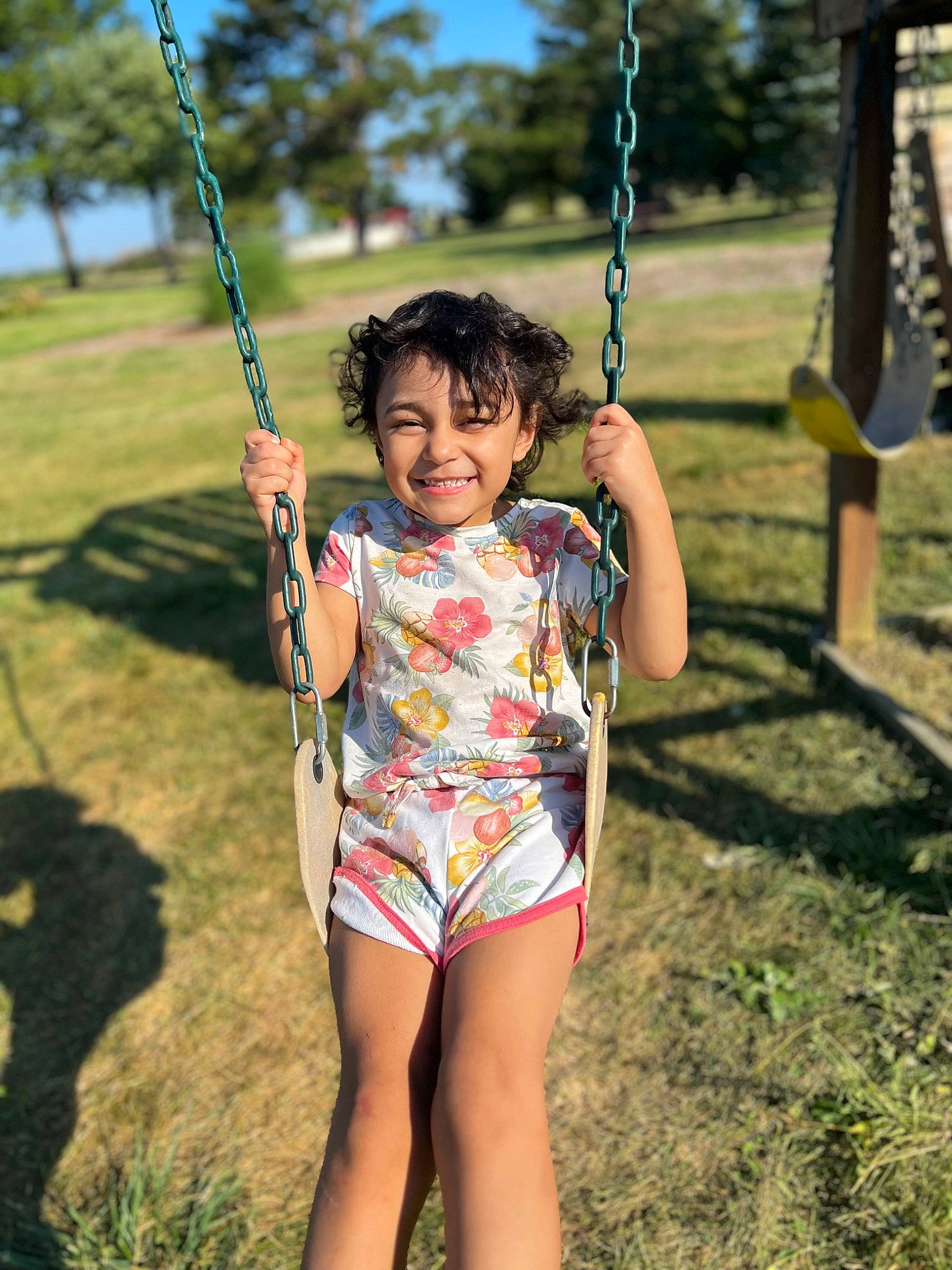Alaia joined the competition — help win amazing prizes! child, city, electric_blue, eye, fun, grass, happy, joy, leisure, one_piece_swimsuit, people_in_nature, person, plant, play, playground, recreation, smile, sunglasses, swing, toddler
