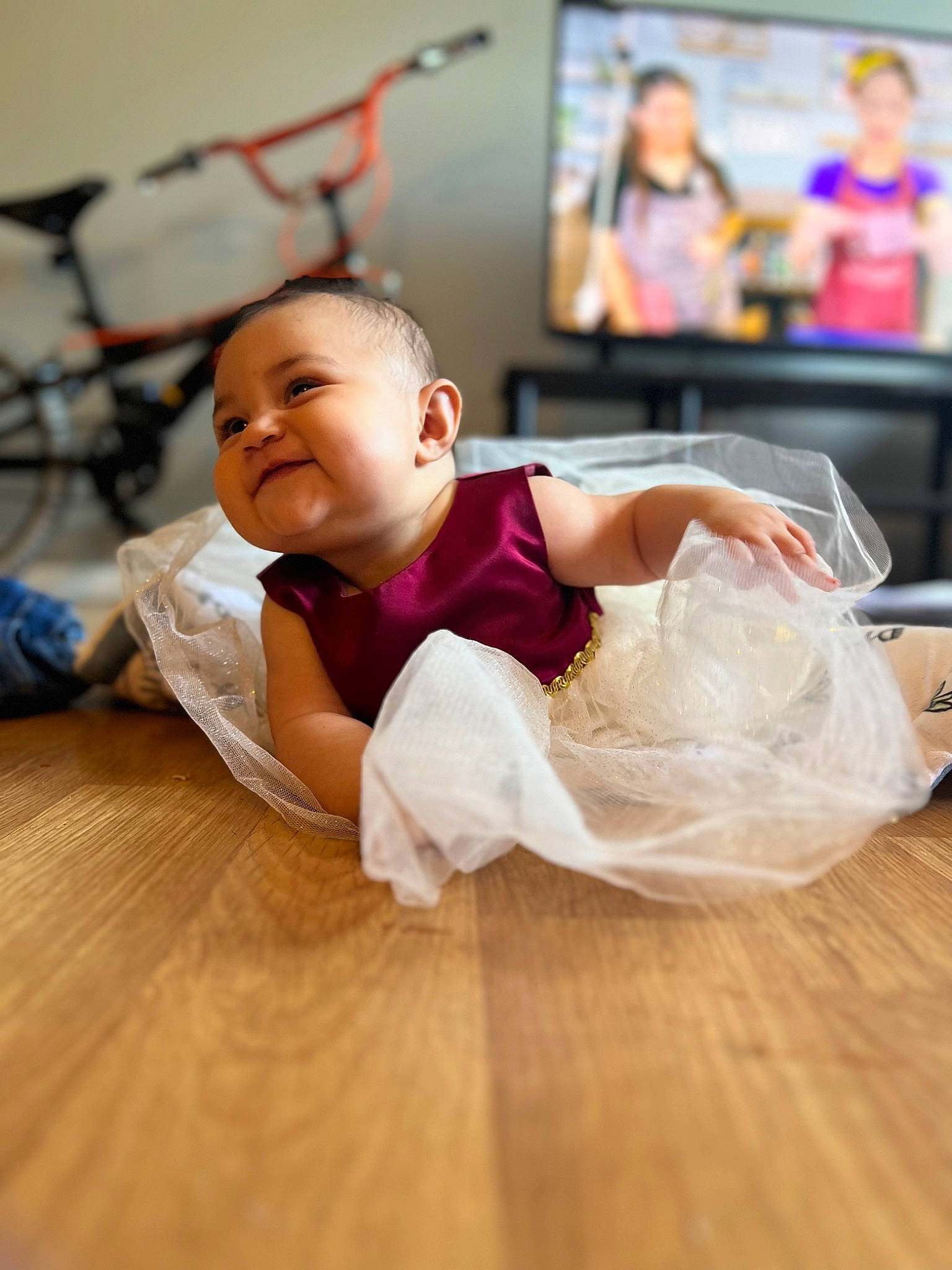 Rose joined the competition — help win amazing prizes! baby, bicycle_wheel, comfort, couch, event, flash_photography, floor, flooring, fun, happy, hardwood, laminate_flooring, leisure, person, smile, television, tire, toddler, wheel, wood