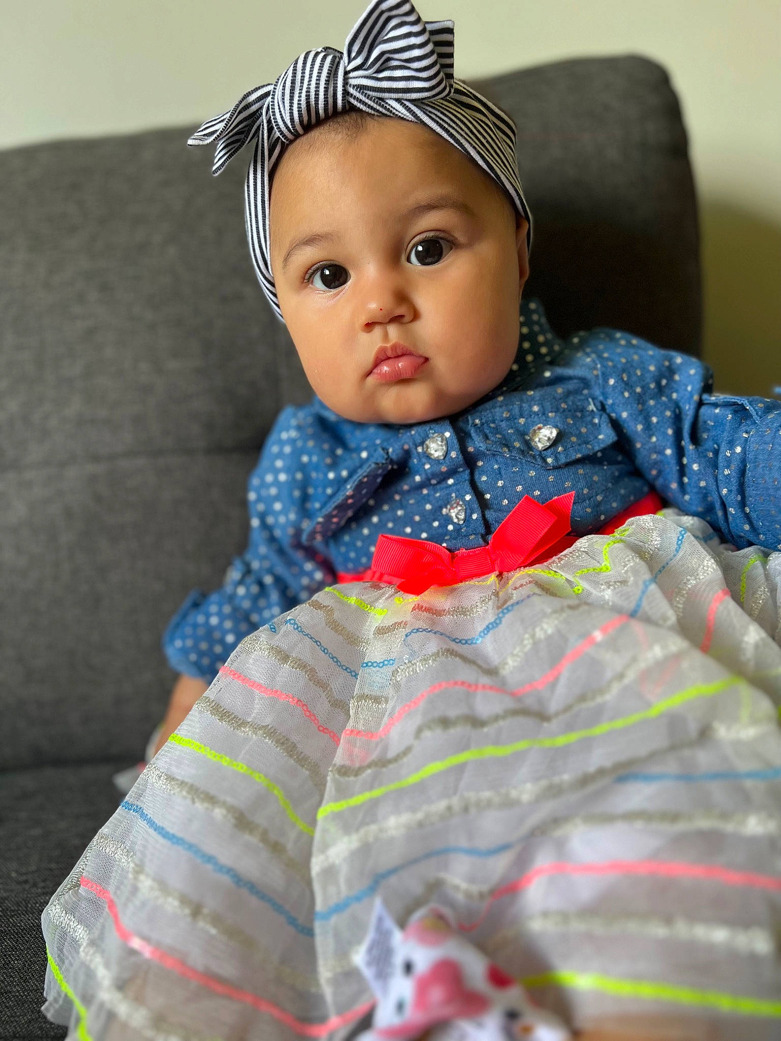 Rose joined the competition — help win amazing prizes! baby, baby_toddler_clothing, cap, costume_hat, couch, doll, dress, electric_blue, eye, eyelash, face, fashion_accessory, headwear, iris, lip, pattern, person, plaid, sleeve, tartan