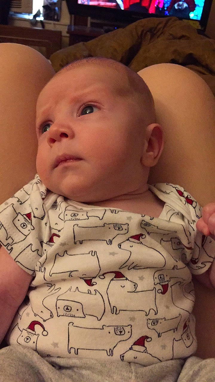 Jeffery is registered to the contest to win money with this photo: baby, baby_toddler_clothing, cheek, chin, comfort, eye, eyebrow, forehead, head, human, human_body, iris, lip, mouth, neck, nose, organ, person, skin, sleeve