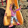Izzabella is registered to the contest to win money with this photo: toddler, slide, playground, child, outdoor, sunny, colorful_shoes, pink_sweater, butterfly, wood_chips, play_equipment, fun, happy, casual_clothing, active, young_child, person, daylight, playtime, smiling