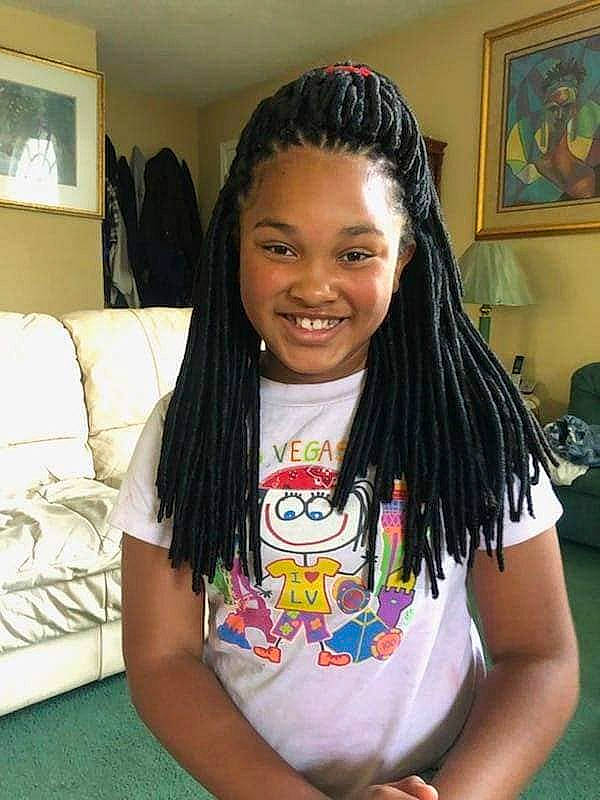 Kiyah is registered to the contest to win money with this photo: black_hair, chest, chin, cool, dreadlocks, eye, eyebrow, facial_expression, forehead, gesture, happy, iris, joy, leisure, long_hair, person, picture_frame, shoulder, smile, t_shirt