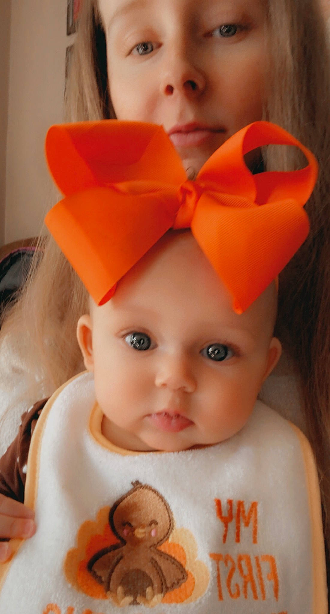 Kahlani is registered to the contest to win money with this photo: baby_toddler_clothing, cheek, child, chin, costume_accessory, ear, eye, eyebrow, forehead, hair_accessory, happy, headgear, headwear, iris, lip, mouth, nose, orange, organ, person