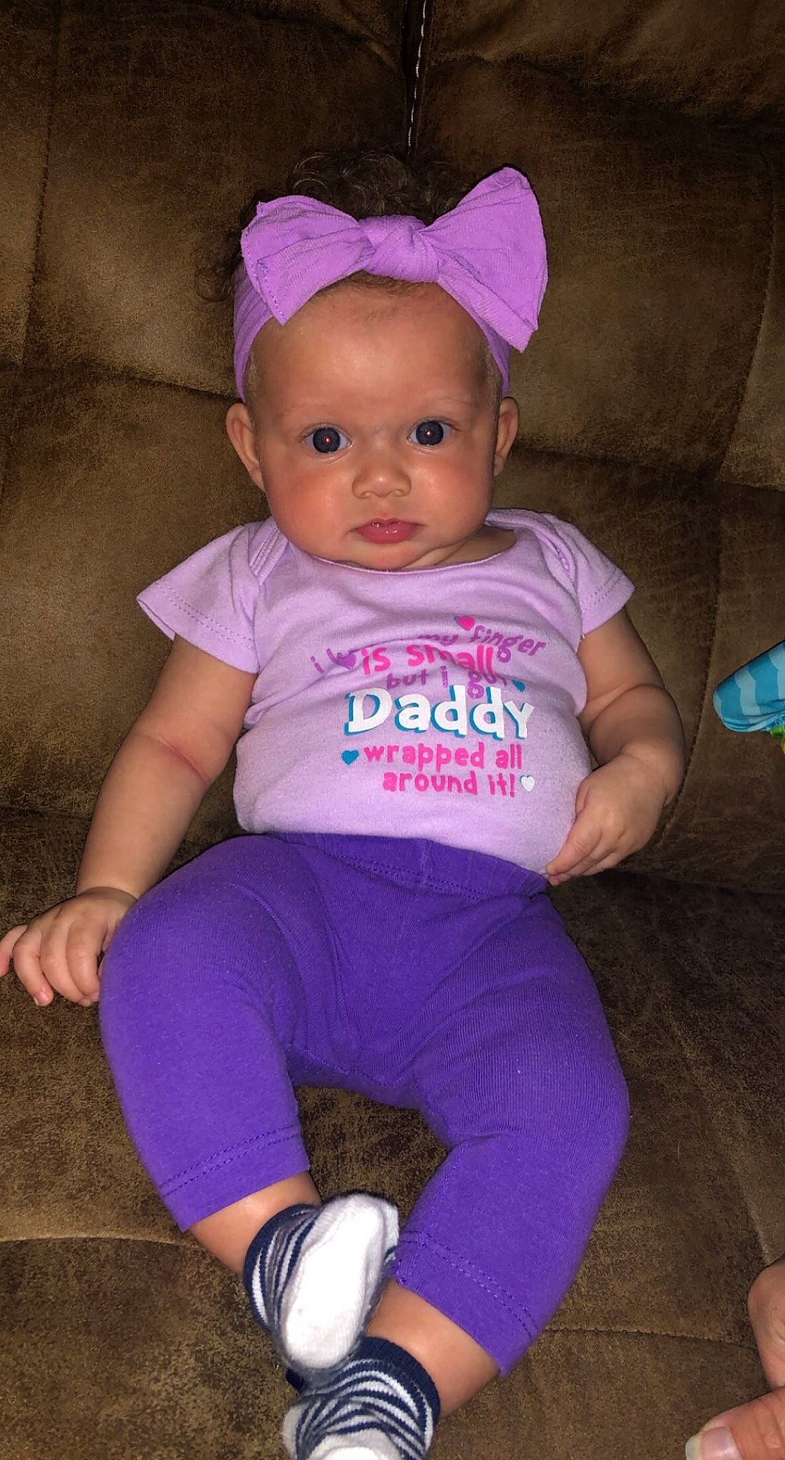 Kahlani is registered to the contest to win money with this photo: active_pants, baby, baby_toddler_clothing, cheek, child, cool, costume_accessory, foot, hair_accessory, headband, headpiece, lavender, magenta, person, pink, purple, shoe, skin, sock, toddler