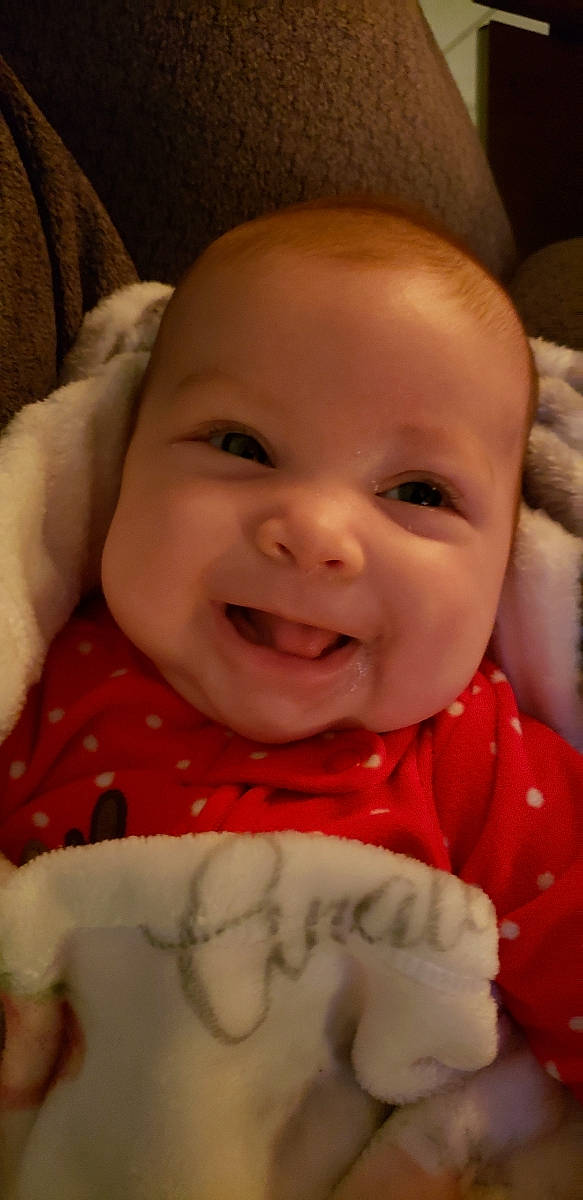 Analeigh is registered to the contest to win money with this photo: baby_toddler_clothing, cheek, child, chin, eye, eyebrow, face, facial_expression, forehead, happy, iris, jaw, joy, lip, mouth, nose, organ, person, skin, smile