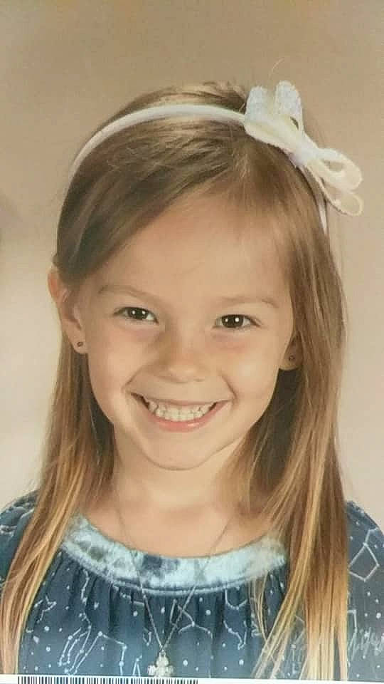 Alexandria is registered to the contest to win money with this photo: bangs, brown_hair, child, child_model, ear, eyebrow, forehead, girl, hair, hair_accessory, hair_coloring, hairstyle, head, headband, headpiece, human_hair_color, iris, joy, long_hair, person