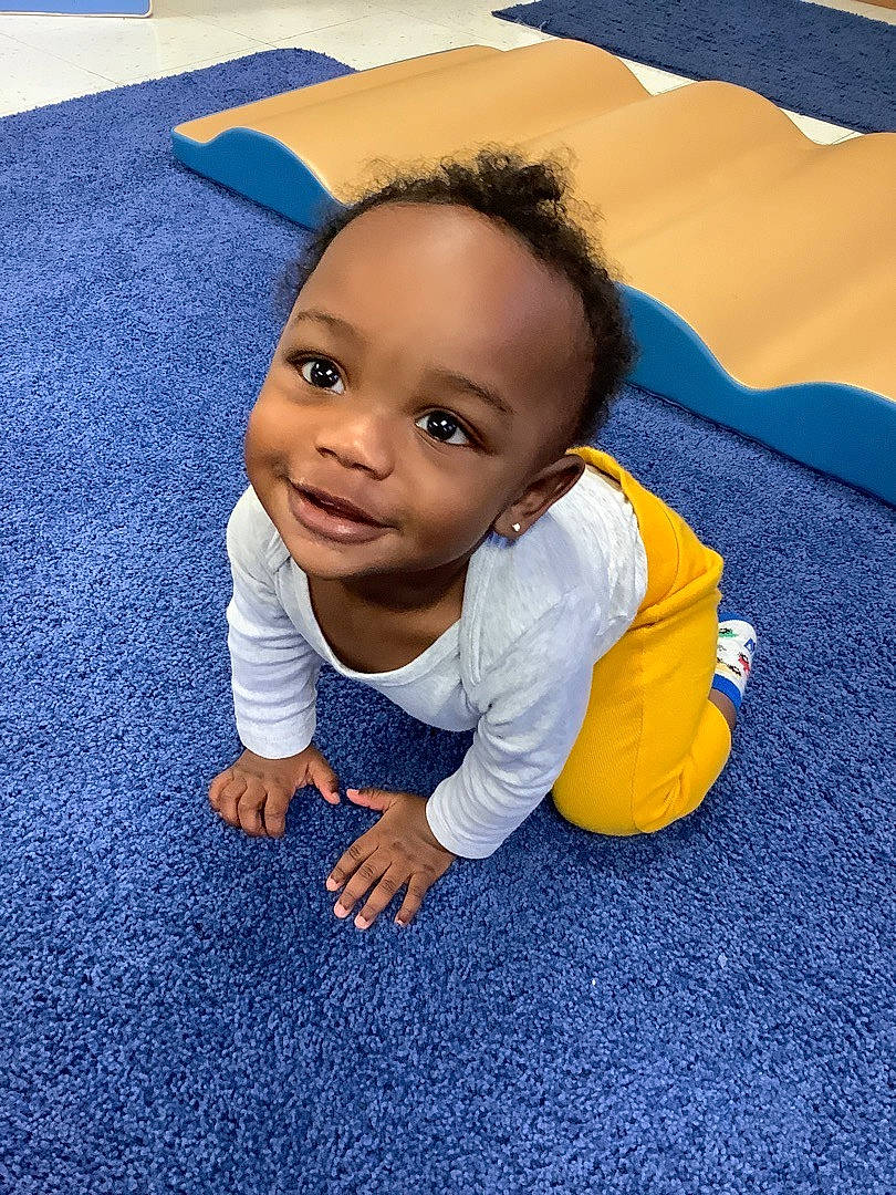 Pierre joined the competition — help win amazing prizes! baby, baby_toddler_clothing, blue, cheek, child, clothing, comfort, electric_blue, finger, floor, flooring, fun, grass, happy, head, joy, nose, person, sitting, sleeve
