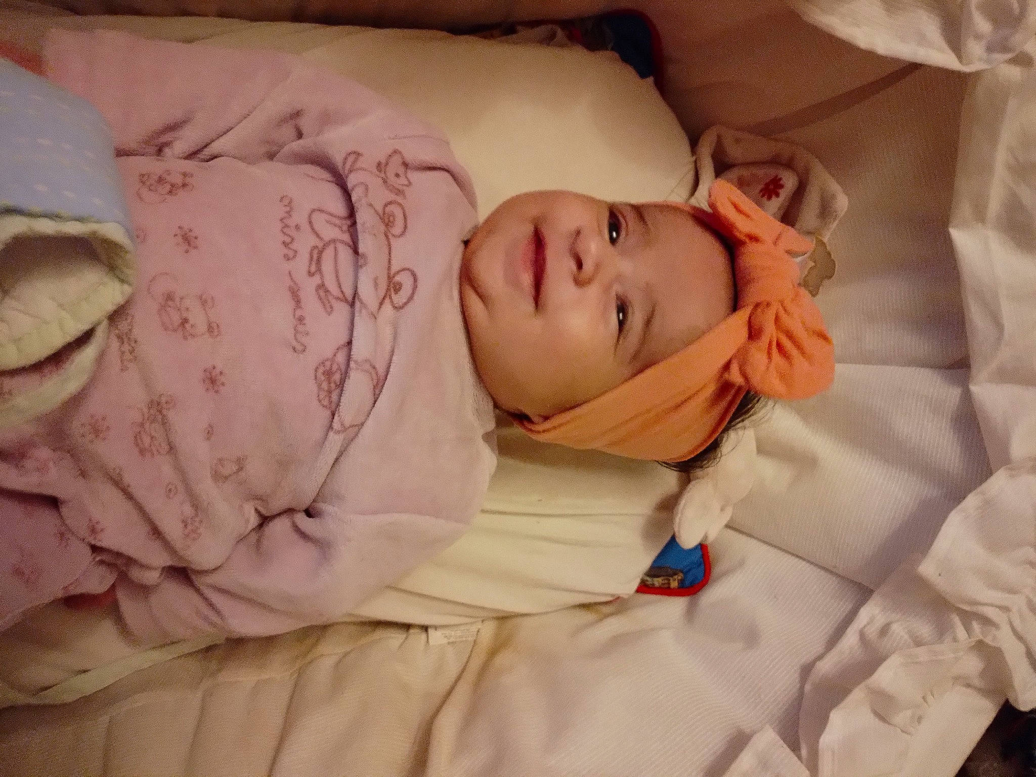 Leila a rejoint le concours — aidez-le/la à gagner de superbes lots ! baby, baby_sleeping, baby_toddler_clothing, bedding, bedtime, cheek, child, comfort, eyelash, hat, headwear, joy, linens, nap, peach, person, pink, room, skin, sleep