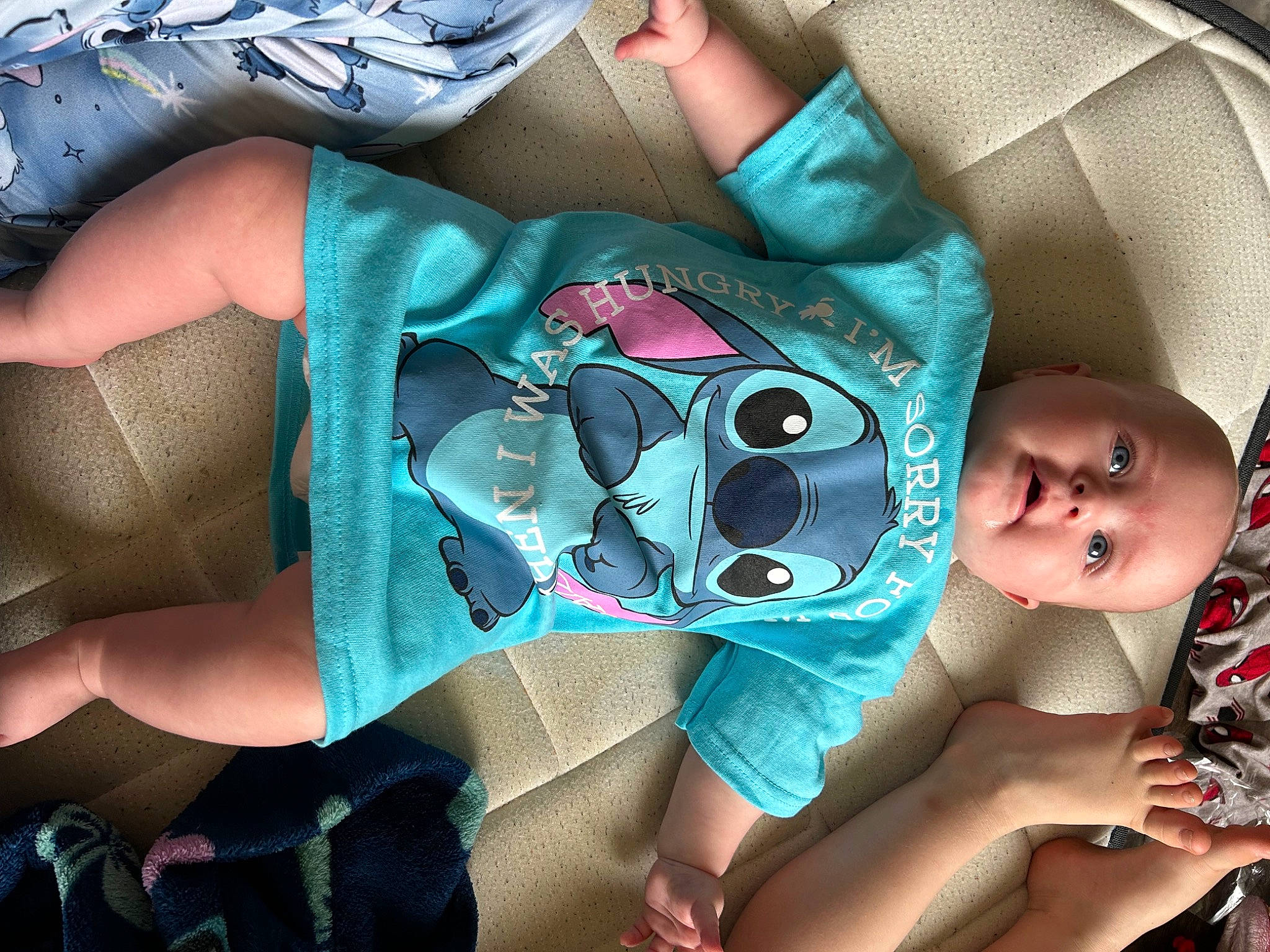 Zelena joined the competition — help win amazing prizes! baby, baby_products, baby_toddler_clothing, blue, child, comfort, elbow, electric_blue, eyewear, fashion_accessory, finger, green, linens, nail, pattern, person, sitting, sleeve, thigh, toddler