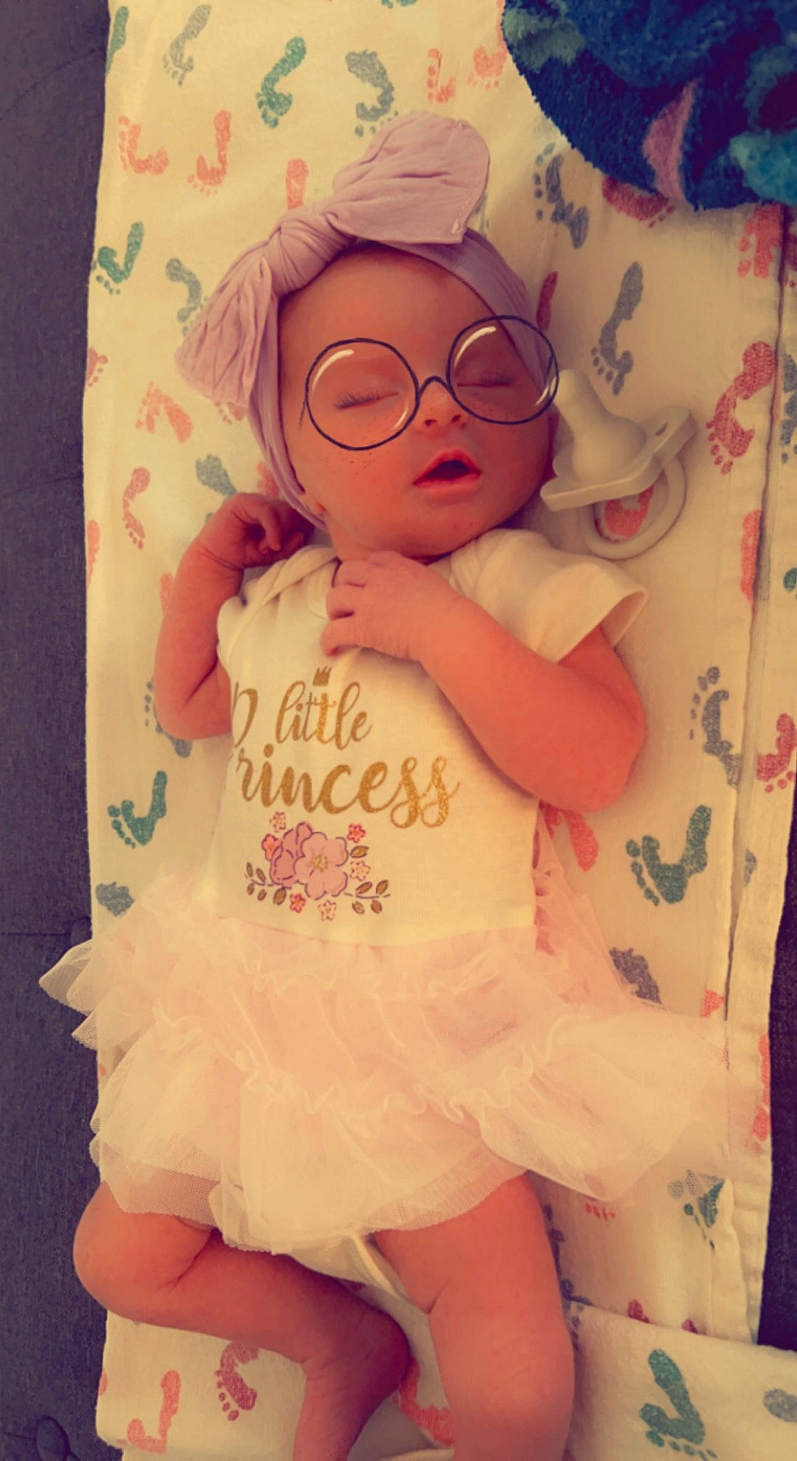 Zelena is registered to the contest to win money with this photo: arm, baby_toddler_clothing, cheek, child, cool, doll, dress, eye, eyewear, glasses, hair, happy, head, headgear, human_body, person, pink, skin, sleeve, sunglasses