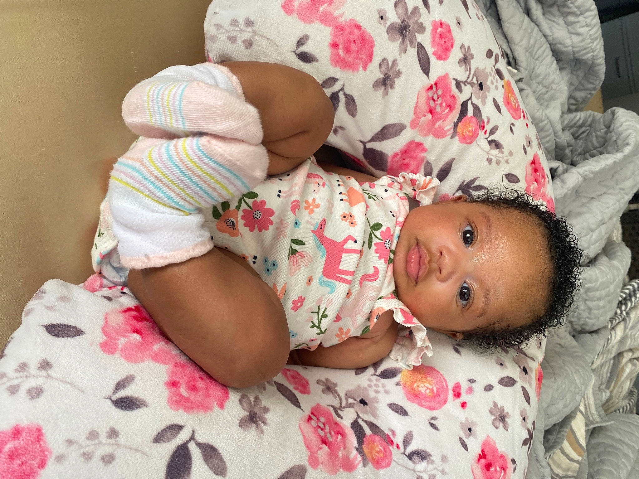 Nia joined the competition — help win amazing prizes! arm, baby, baby_products, baby_toddler_clothing, cheek, comfort, eye, face, facial_expression, hand, hat, headgear, human_body, linens, mouth, person, pink, skin, sleeve, textile