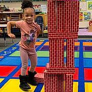 Isreãl joined the competition — help win amazing prizes! child, girl, classroom, blocks, toy, carpet, colorful, education, learning, play, building, stack, furniture, poster, boots, clothing, smile, hair, indoor, preschool