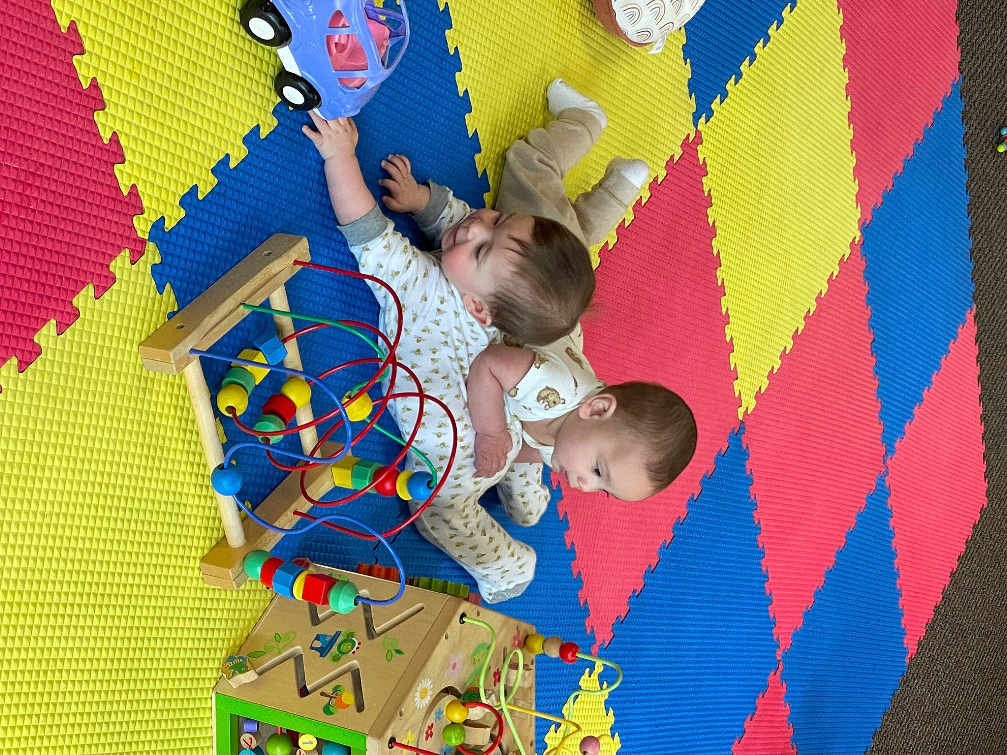 Cole joined the competition — help win amazing prizes! art, baby_toys, child, electric_blue, flooring, fun, indoor_games_and_sports, leisure, person, play, product, recreation, red, room, sharing, space, textile, toddler, toy, visual_arts