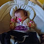 baby, sleeping, pacifier, blanket, infant, cushion, baby_seat, indoor, child, soft, cozy, clothing, face, head, person, resting, young, cute, comfort, nap