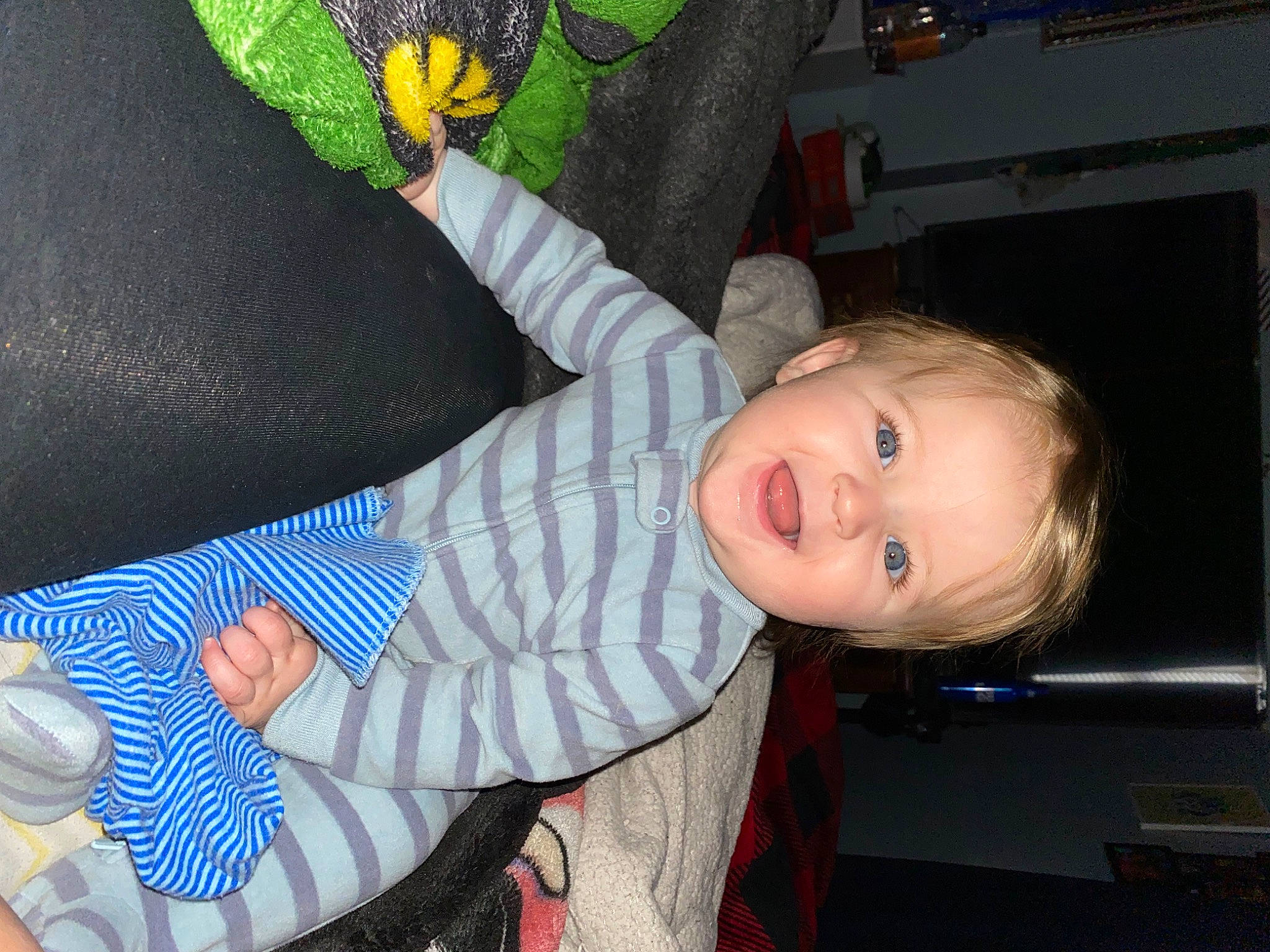 Harrison joined the competition — help win amazing prizes! baby, baby_products, baby_toddler_clothing, child, comfort, finger, fun, happy, lap, parrot, pattern, person, room, sitting, smile, textile, toddler