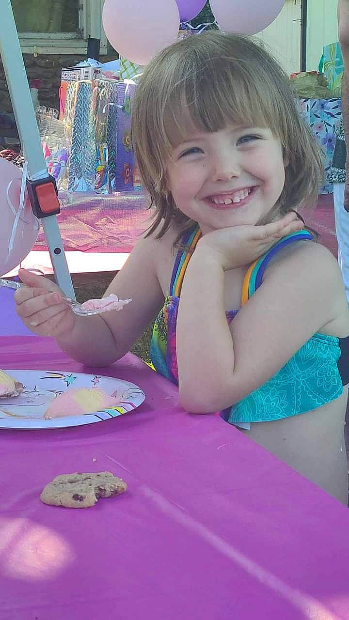 Presley joined the competition — help win amazing prizes! blond, chair, child, event, fun, happy, joy, leisure, magenta, person, pink, plate, purple, recreation, sitting, smile, summer, table, tableware, toddler