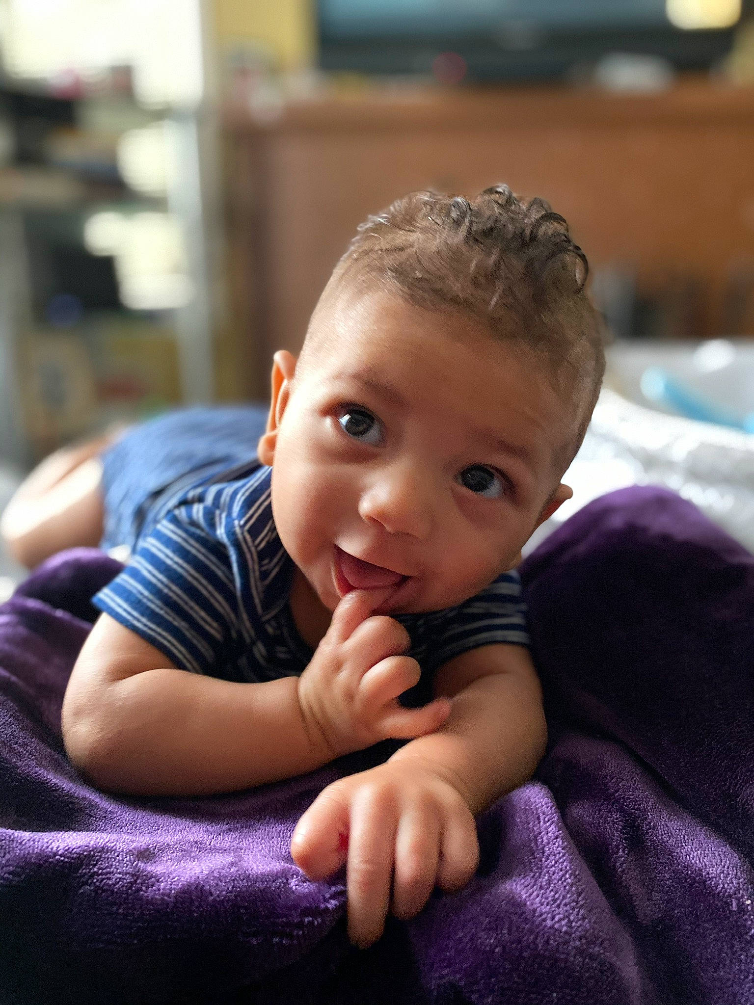 Boston is registered to the contest to win money with this photo: baby, cheek, child, chin, eye, face, forehead, head, nose, person, sitting, skin, toddler