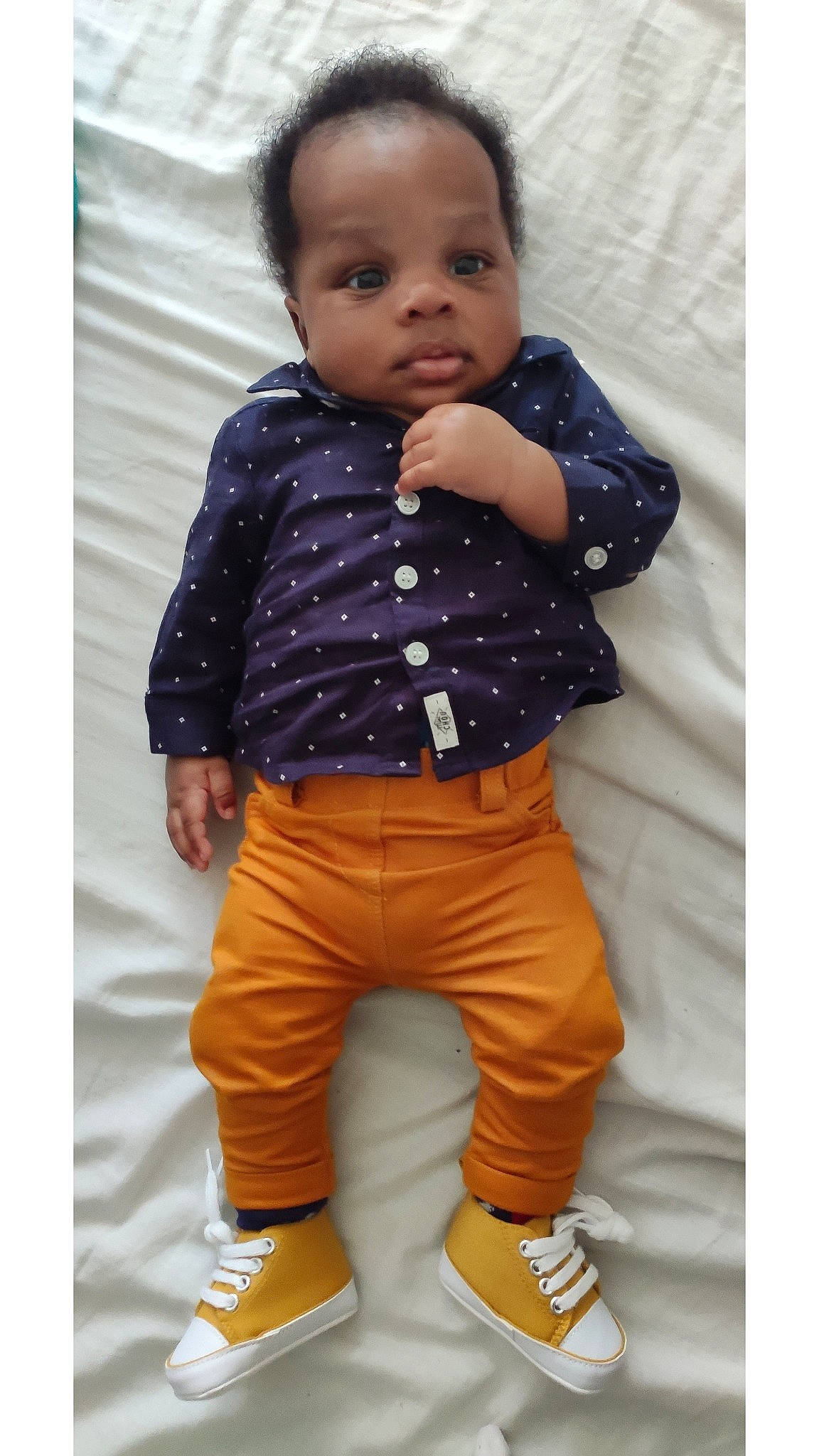 Gabriel participe au concours pour gagner de l'argent avec cette photo : arm, baby, baby_toddler_clothing, collar, cool, dress_shirt, face, gesture, hairstyle, happy, khaki_pants, pattern, person, product, sleeve, smile, standing, t_shirt, textile, toddler