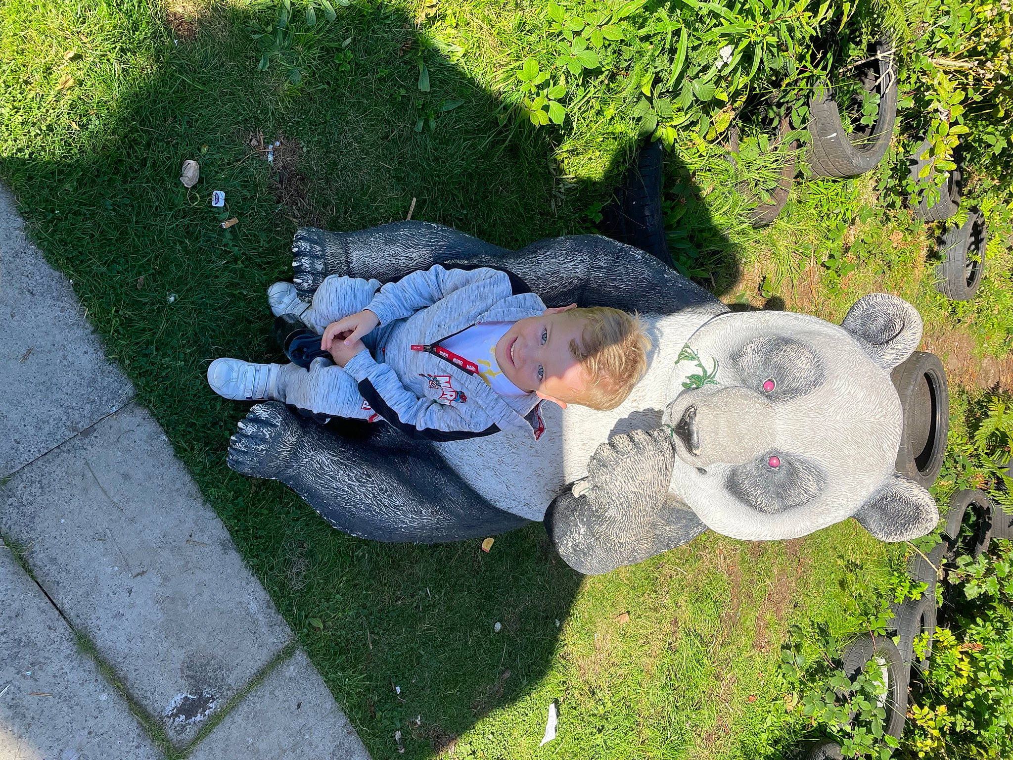 Oliver joined the competition — help win amazing prizes! fun, garden, grass, grass_family, groundcover, hat, jeans, joy, landscape, lawn, leaf, leisure, people_in_nature, person, plant, recreation, shoe, shrub, sitting, sneakers