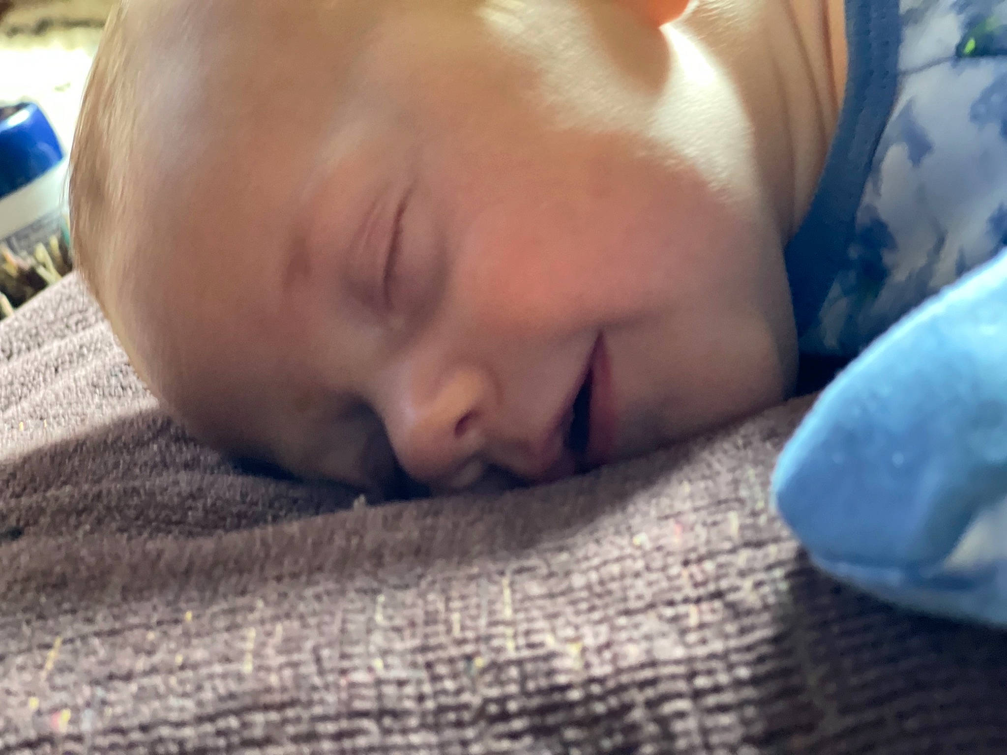 Ryker is registered to the contest to win money with this photo: baby, bedtime, cheek, child, comfort, finger, fur, grass, happy, iris, linens, nap, nose, person, portrait_photography, room, skin, sleep, smile, toddler