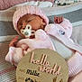 baby, birthdaycake, blanket, bonnet, cake, cap, clothing, cream, dessert, face, furniture, hat, head, homedecor, newborn, person, photography, portrait, quilt, sleeping