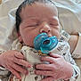 Denver is registered to the contest to win money with this photo: newborn, baby, pacifier, sleeping, hands, clothing, blanket, face, infant, cute, soft, resting, cozy, closeup, child, person, skin, bed, hospital, wrists