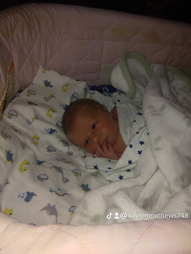 Garrett is registered to the contest to win money with this photo: baby, baby_products, baby_sleeping, baby_toddler_clothing, bedding, bedtime, child, comfort, head, linens, nap, person, sleep, toddler