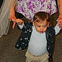 Jason is registered to the contest to win money with this photo: adult, baby, carpet, child, clothing, curly_hair, cute, floor, floral, hands, indoor, jacket, pants, pattern, person, shirt, support, toddler, veil, walking