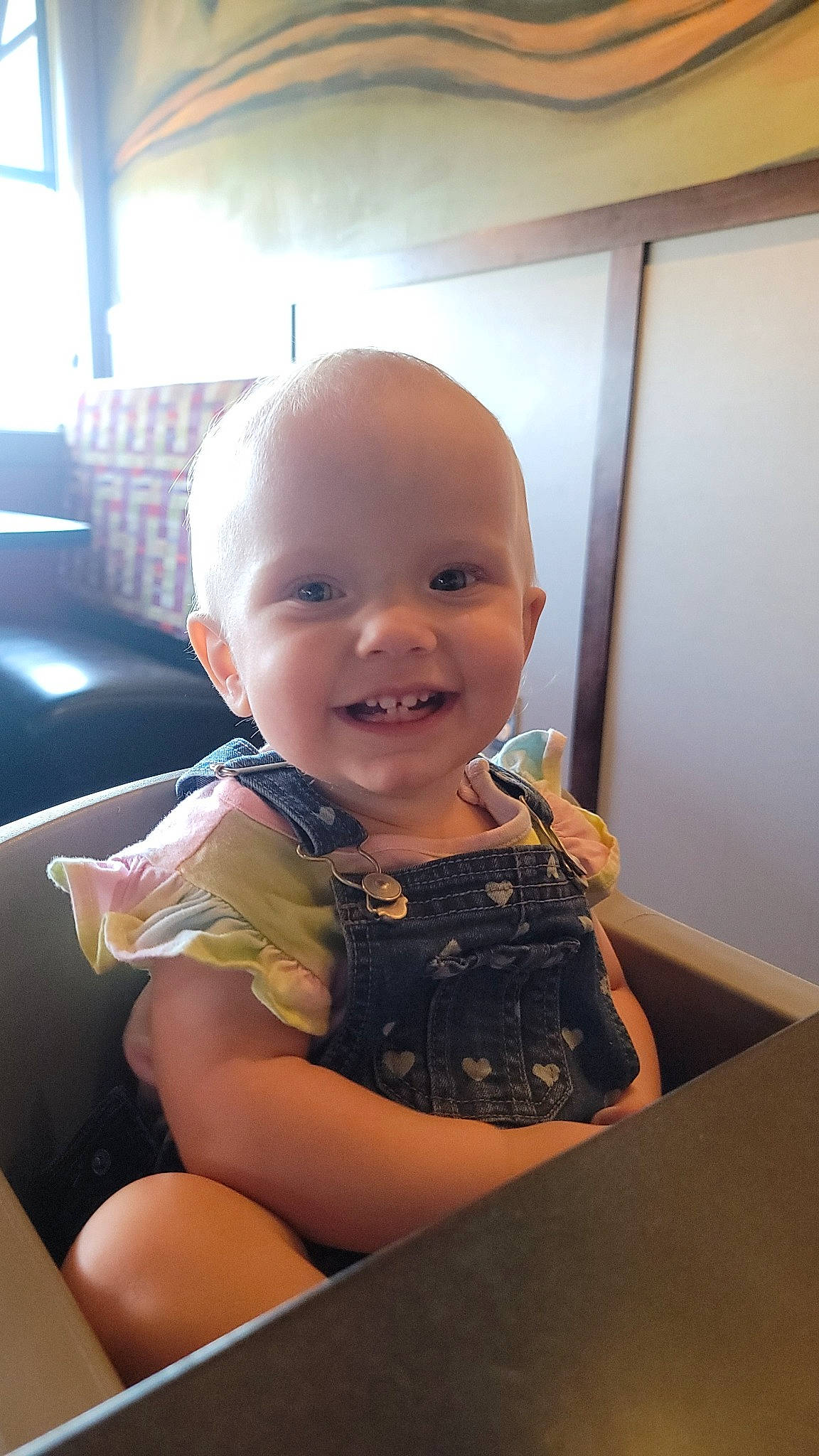 Wrenley is registered to the contest to win money with this photo: baby, baby_laughing, baby_toddler_clothing, cheek, child, comfort, flooring, fun, happy, joy, person, room, sitting, smile, t_shirt, thumb, toddler