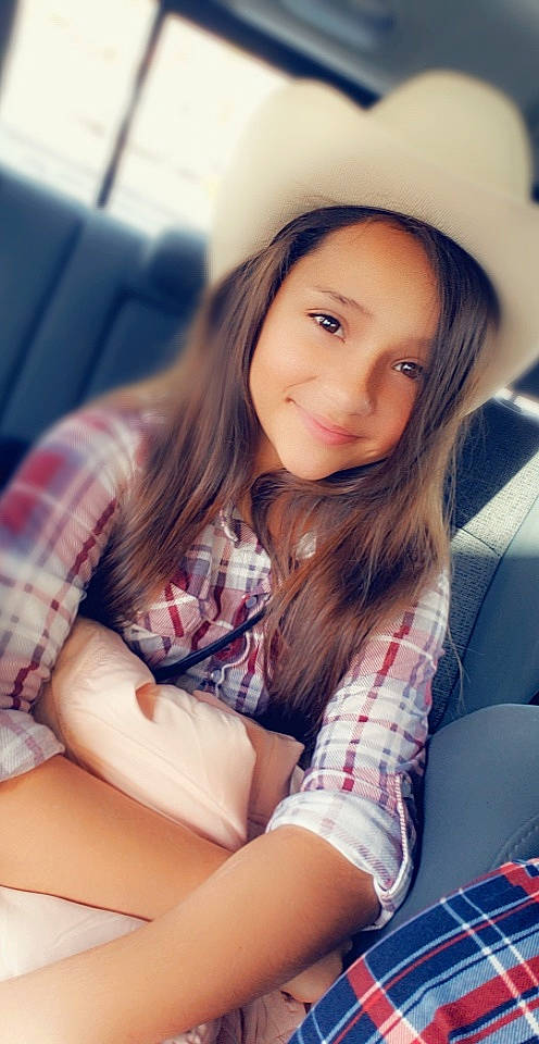 Karissa joined the competition — help win amazing prizes! beauty, brown_hair, cool, design, eye, face, hair, human_leg, joy, lady, leg, lip, long_hair, pattern, person, photography, plaid, selfie, sitting, skin