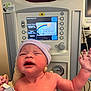 architecture, baby, building, cap, childbirth, clothing, computerhardware, electronics, face, glove, hardware, hat, head, hospital, monitor, newborn, person, photography, portrait, screen